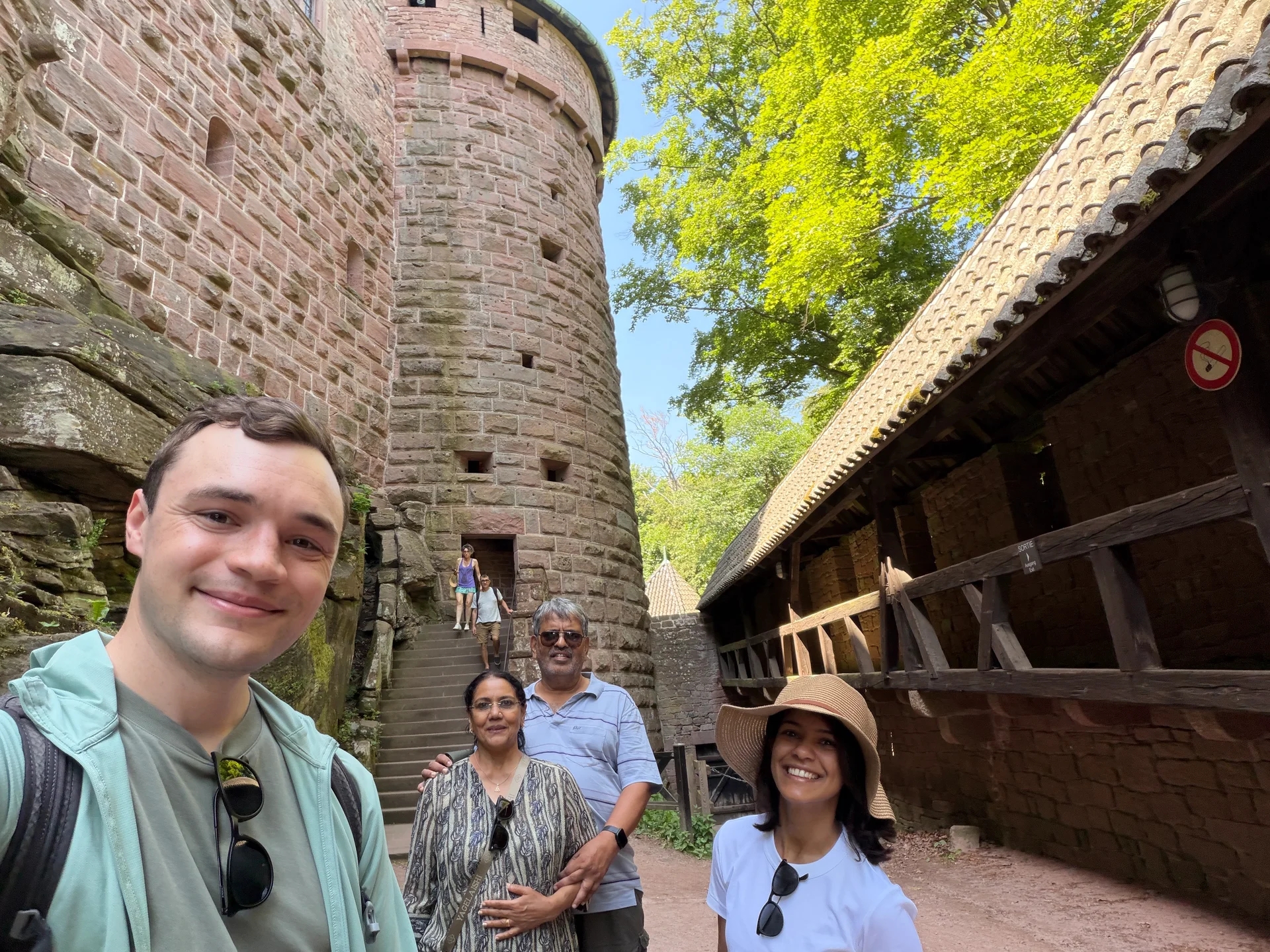 The group taking a selfie inside the sandstone walls of the 15th-century castle